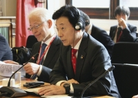 Yasutoshi Nishimura, Japan's minister of economy, trade and industry, attends a bilateral ministerial meeting with his British counterpart on economic security in London on Wednesday.  | Pool / via Kyodo 