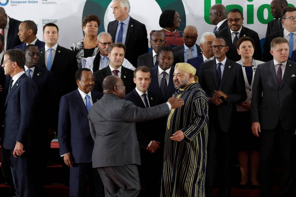 French President Emmanuel Macron (center) and deposed president Ali Bongo of Gabon (center left) at an African Union-European Union summit in 2017
