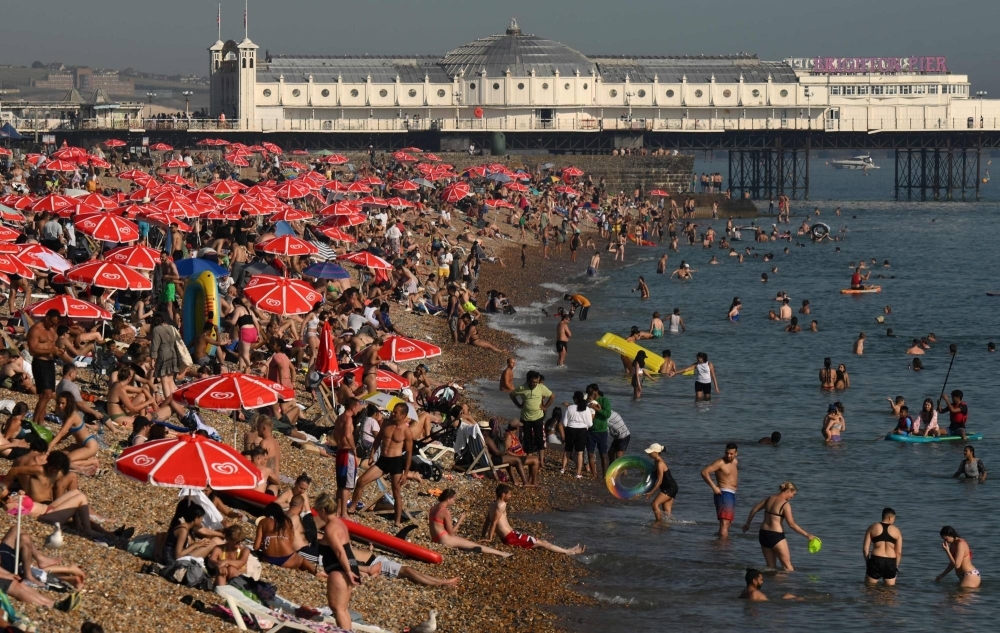 The beach at Brighton, on the south coast of England on Thursday, as the late summer heat wave continues.