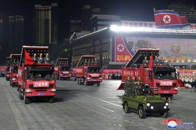 A paramilitary parade is held in Pyongyang's Kim Il Sung Square to mark the 75th founding anniversary of North Korea in this photo released Saturday. 