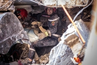Rescue workers search for survivors in a collapsed house in Moulay Brahim, Morocco, on Saturday after a powerful earthquake hit the country.  | AFP-JIJI