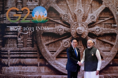 Indian leader Narendra Modi shakes hand with Prime Minister Fumio Kishida ahead of the Group of 20 leaders' summit in New Delhi on Saturday.