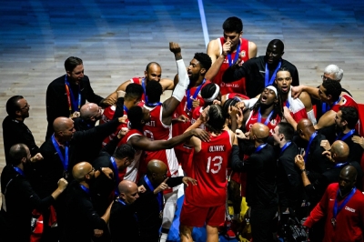 Team Canada celebrates after beating the United States in the bronze-medal match at the 2023 FIBA Basketball World Cup in Manila on Sunday.