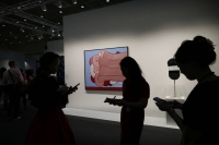 Visitors take a look around at the Frieze art fair in Seoul on Wednesday. | REUTERS
