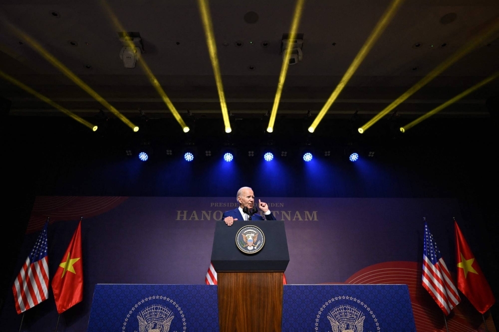 U.S. President Joe Biden holds a news conference in Hanoi on Sunday, the first day of a visit in Vietnam.