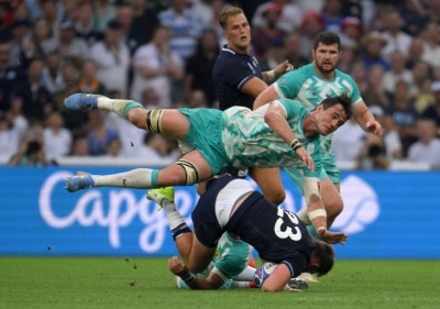 South Africa's Franco Mostert (top) attempts to tackle Scotland fullback Oliver Smith during their match at the Rugby World Cup in Marseille, France, on Sunday.