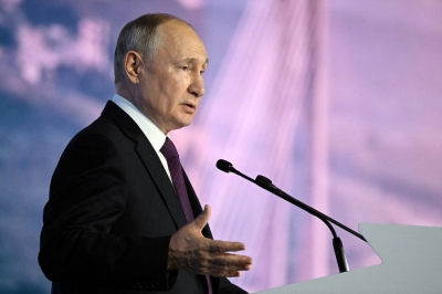 Russian President Vladimir Putin speaks during the Eastern Economic Forum in Vladivostok, Russia, on Tuesday.