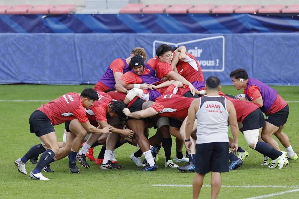 The Brave Blossoms prepare for their Rugby World Cup match against England during a training session in Toulouse, France, on Wednesday.