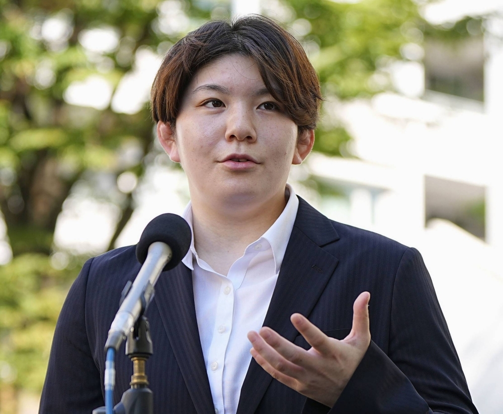 Rina Gonoi speaks to reporters in Yokohama in July.