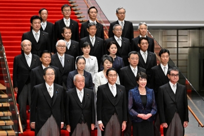 Prime Minister Fumio Kishida with his new Cabinet at his official residence in Tokyo on Wednesday