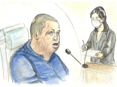 Shinji Aoba speaking during a trial at the Kyoto District Court, in a court illustration
