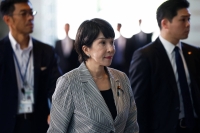 Sanae Takaichi, who retained her post as economic security minister, plans to submit a revised economic security bill that includes a security clearance system during a parliamentary session starting in early 2024. | Reuters