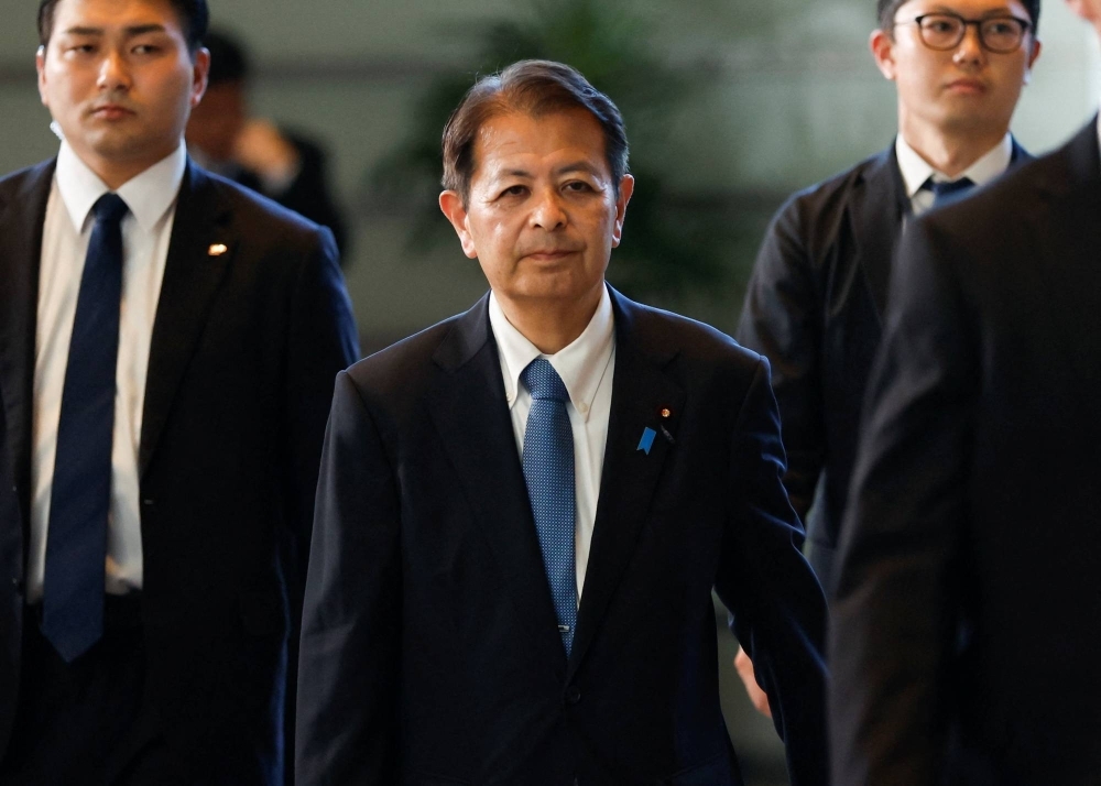 Ichiro Miyashita arrives at the Prime Minister's Office on Wednesday after being named the new minister of agriculture, forestry and fisheries in a Cabinet reshuffle the same day. 