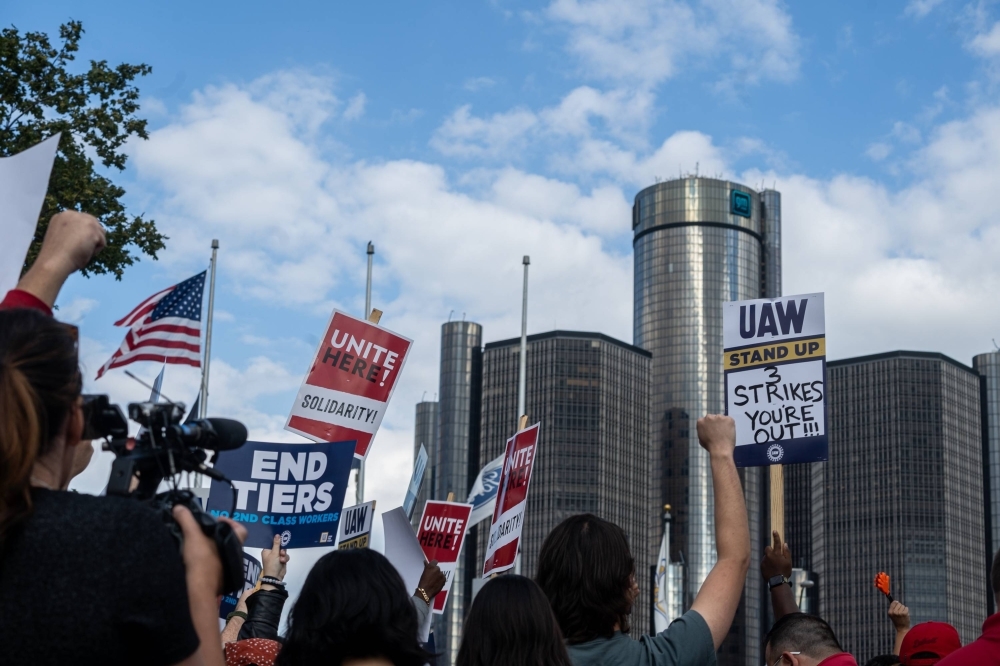 Striking UAW autoworkers demonstrate at a rally in downtown Detroit on Friday.