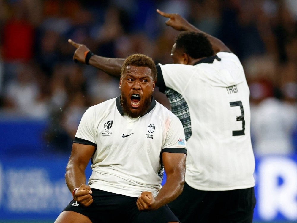 Fiji's Tevita Ikanivere celebrates after his team's win over Australia at the Rugby World Cup in Saint-Etienne, France, on Sunday.