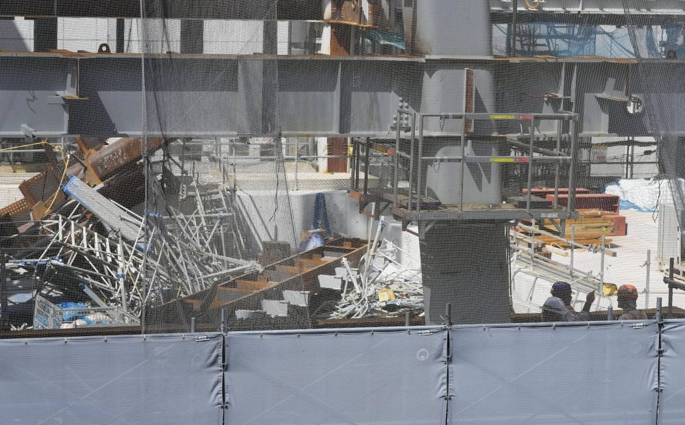 A construction site where workers fell, with at least two killed, in Tokyo's Chuo Ward on Tuesday