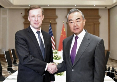U.S. national security adviser Jake Sullivan shakes hands with Chinese Foreign Minister Wang Yi in Malta on Sunday.