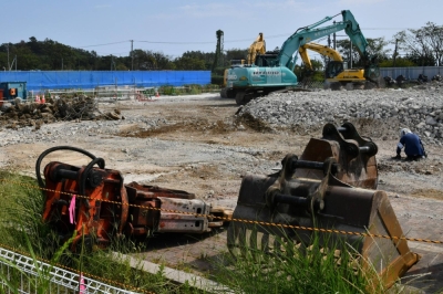 A site in a specified reconstruction area in Okuma, Fukushima Prefecture, where demolition and decontamination work is conducted
