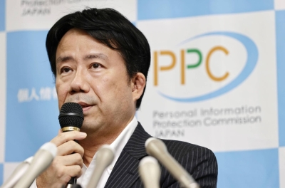 Hidemi Kataoka, a counselor in charge of policy planning at the Personal Information Protection Commission, speaks during a news conference in Tokyo on Wednesday.