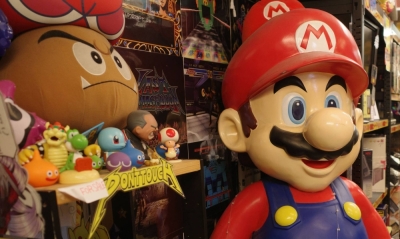 Characters from the Super Mario Bros. franchise adorn the front of Super Potato, a well-known retro game shop in Akihabara. 