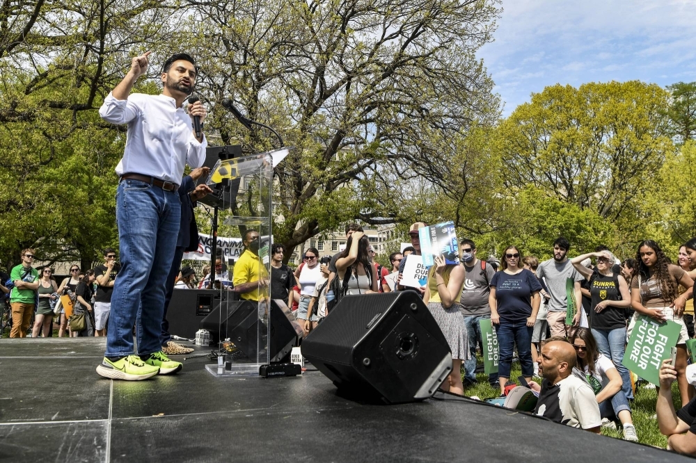 Ali Zaidi, the White House climate adviser, at a climate rally outside the White House, in Washington on April 23, 2022.