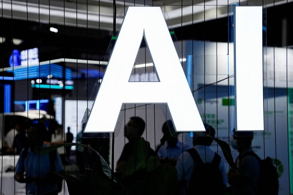 A sign at the World Artificial Intelligence Conference in Shanghai on July 6. AI and quantum information science have recently become a major issue in international politics.