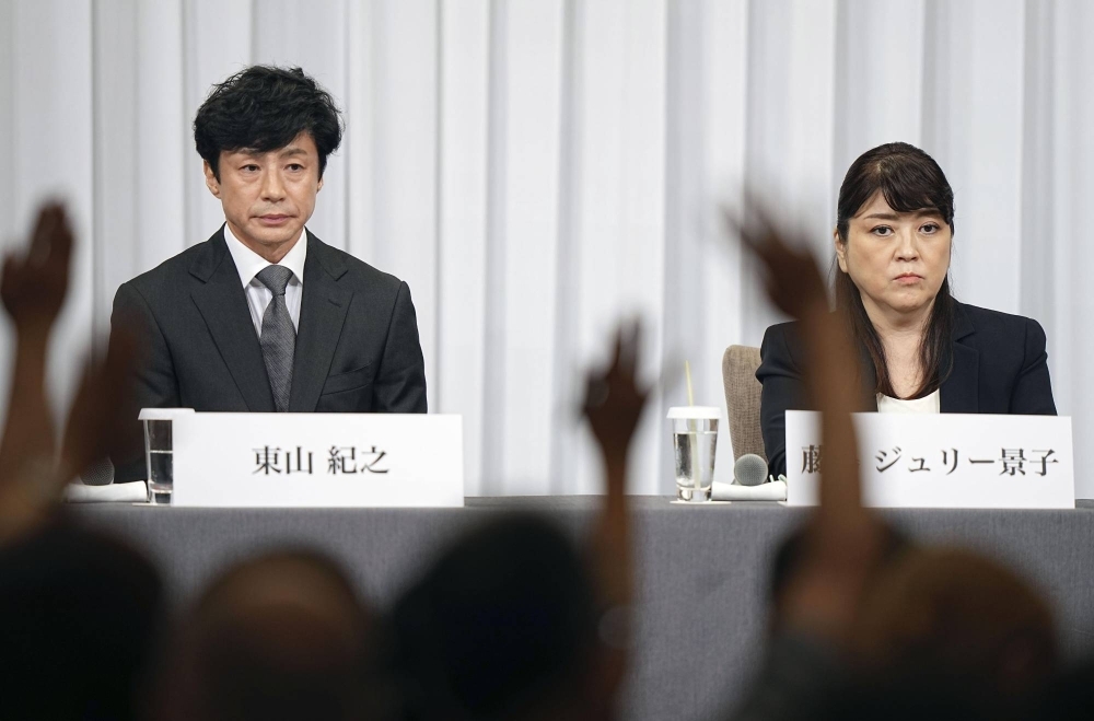 Johnny & Associates' new president Noriyuki Higashiyama (left) and former president Julie Keiko Fujishima at a news conference in Tokyo on Sept. 7