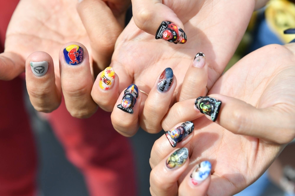 One dedicated fan spent a week designing nail decorations for herself and her partner.