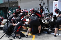 Haas pit crew members train on Friday morning. | Dan Orlowitz