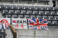 Banners supporting Mercedes driver Lewis Hamilton are hung from the main grandstand on Friday. | Dan Orlowitz