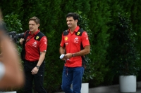 Ferrari driver Carlos Sainz arrives at the Suzuka Circuit paddock on Friday morning. | Dan Orlowitz