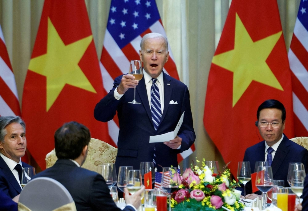 U.S. President Joe Biden raises a toast with Vietnamese President Vo Van Thuong in Hanoi on Sept. 11.