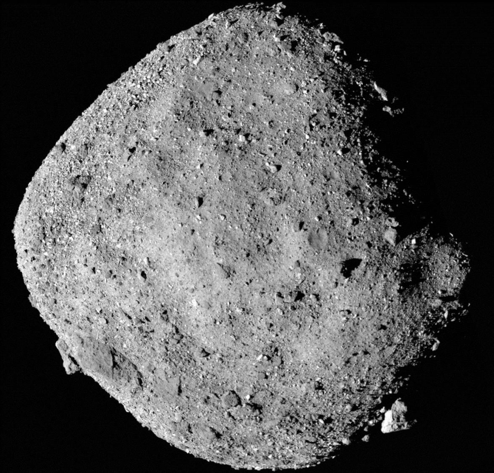 A mosaic image of the asteroid Bennu, composed of 12 PolyCam images collected in December 2018 by the OSIRIS-REx spacecraft from a range of 24 kilometers  
