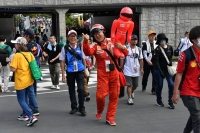 Fans steam into the main gates at Suzuka Circuit ahead of the Japanese Grand Prix on Sunday. | Dan Orlowitz 
