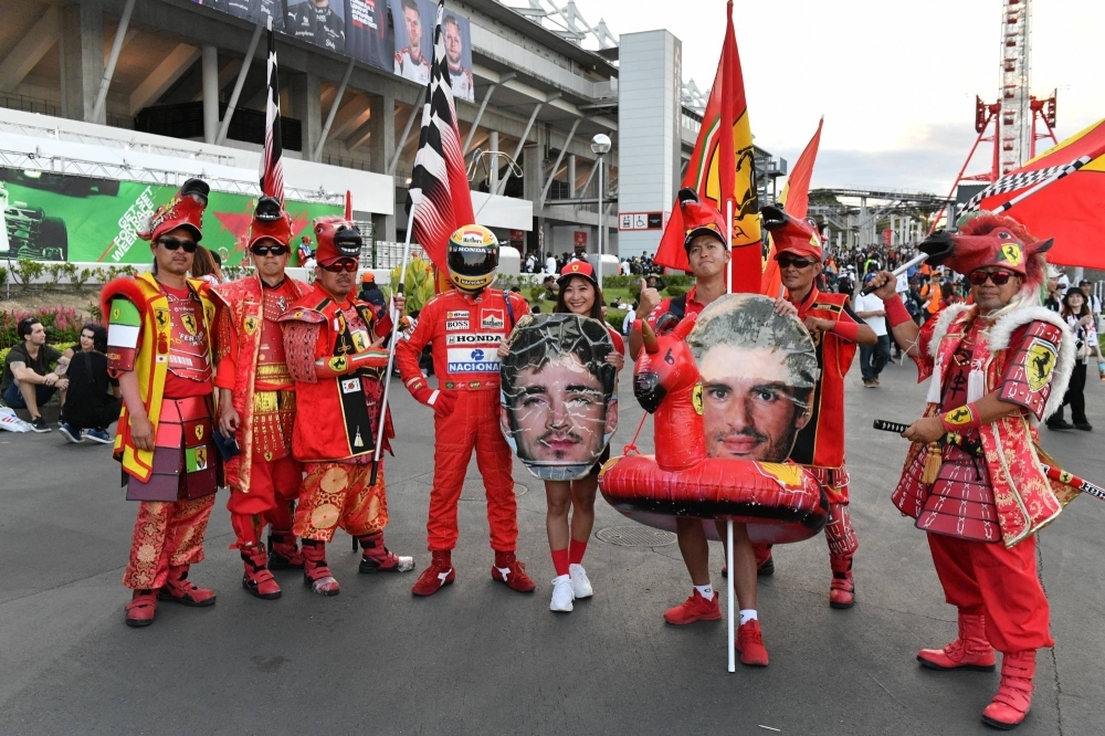 Ferrari fans gather after the race.