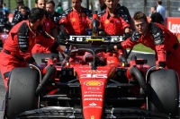 Ferrari engineers roll Charles Leclerc's car into position ahead of the race. | Dan Orlowitz
