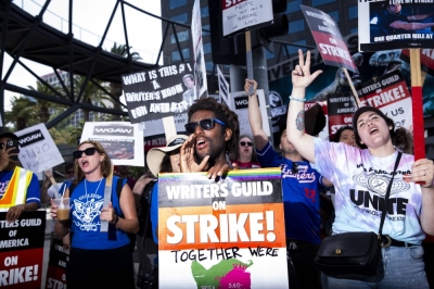 Members of the Writers Guild of America picket outside of Universal Studios in Universal City, California, on Friday.