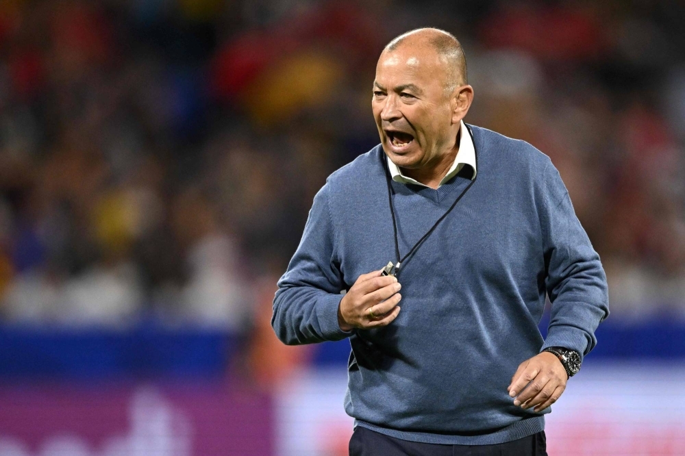 Australia head coach Eddie Jones directs his team before their match against Wales at the Rugby World Cup in Lyon, France, on Sunday.