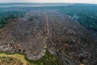 An aerial view of part of the 95,000-hectare Rio Preto-Jacunda State Nature Reserve, in Rondonia State, Brazil, after it was burned down, on Sept. 6. | RIOTERRA / via AFP-Jiji
