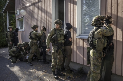 Finnish Army conscripts with the 2nd Military Police Company during a training exercise in a suburb of Helsinki on Sept. 6. After decades of going it alone in security issues, Finns are finding that life in a large alliance is complex, expensive and deeply political.