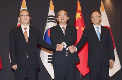 (From left) Takehiro Funakoshi, Chung Byung-won and Nong Rong, senior diplomats from Japan, South Korea and China, respectively, before their meeting in Seoul on Tuesday.