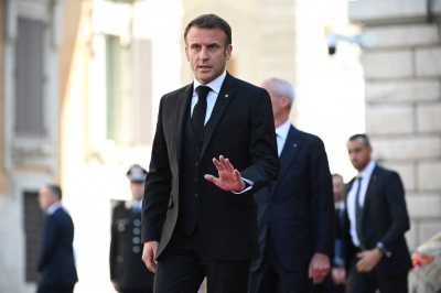French President Emmanuel Macron arrives at the Palazzo Montecitorio in Rome on Tuesday.