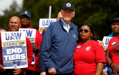 U.S. President Joe Biden joins striking members of the United Auto Workers (UAW) on the picket line outside the GM's Willow Run Distribution Center, in Belleville, Michigan, on Tuesday.