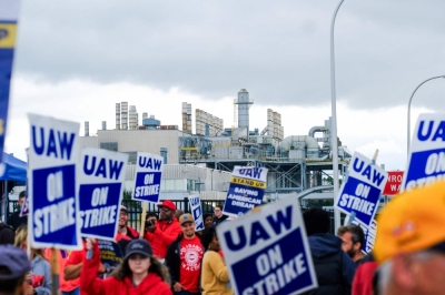 Members of the United Auto Workers pickett outside of the Michigan Parts Assembly Plant in Wayne, Michigan, on Tuesday.