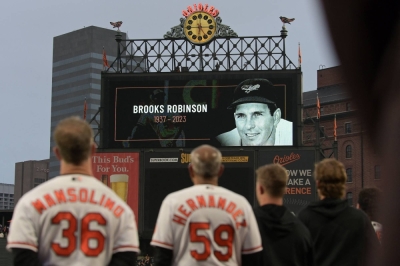 A moment of silence is held for Robinson before the Orioles' game against the Nationals in Baltimore, Maryland, on Tuesday.