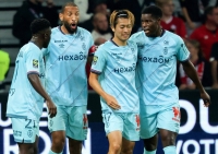 Reims forward Keito Nakamura (second from right) celebrates after scoring his first goal for the team in its French first-division match against Lille in Villeneuve-d'Ascq, France, on Tuesday. | AFP-Jiji