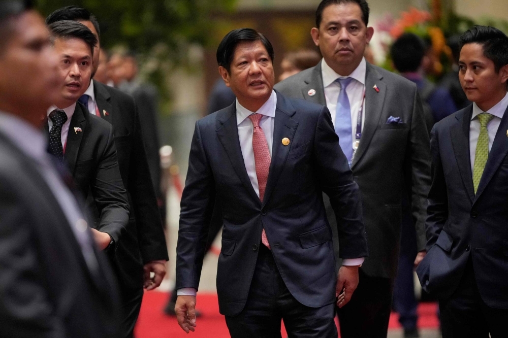 Philippine President Ferdinand Marcos Jr. leaves a meeting in Jakarta on Sept. 7.