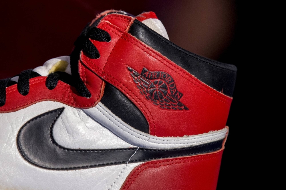 The famous Nike swoosh and Air Jordan logo on an Air Jordan 1, called "Notorious" and released from 1984-85, during a preview for "The Rise of the Sneaker Culture" exhibit at the Brooklyn Museum in New York in 2015.