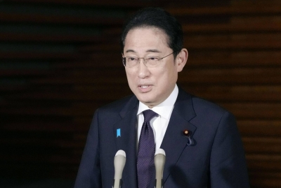 Prime Minister Fumio Kishida speaks to reporters in Tokyo on Friday. 