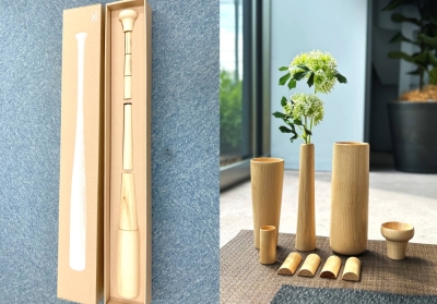 The Materials Provided by Mizuno Baseball Bat Tableware set is made from a recycled, discarded baseball bat and includes two large tumblers, a vase, a small cup, four cutlery rests and a sake cup.